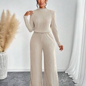 Elegant Striped Jumpsuit in Cream and Black